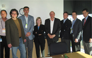People sitting around a table writing